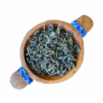 Kenyan Green Tea Loose Leaf presented in a wooden bowl