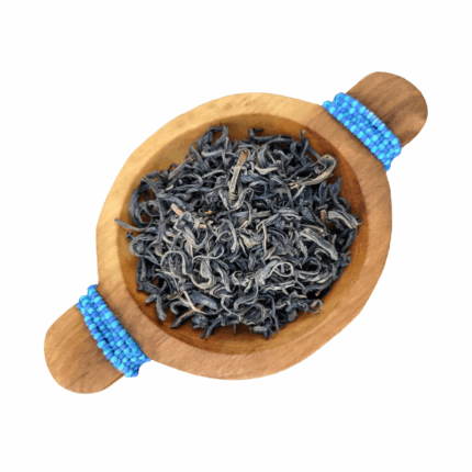 Kenyan Purple Tea Loose Leaf presented in a wooden bowl
